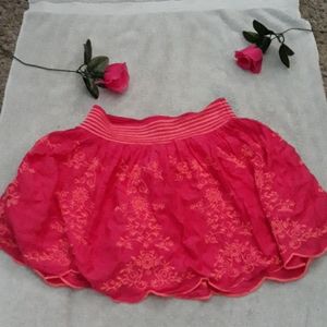 Pink embroidered mini skirt
